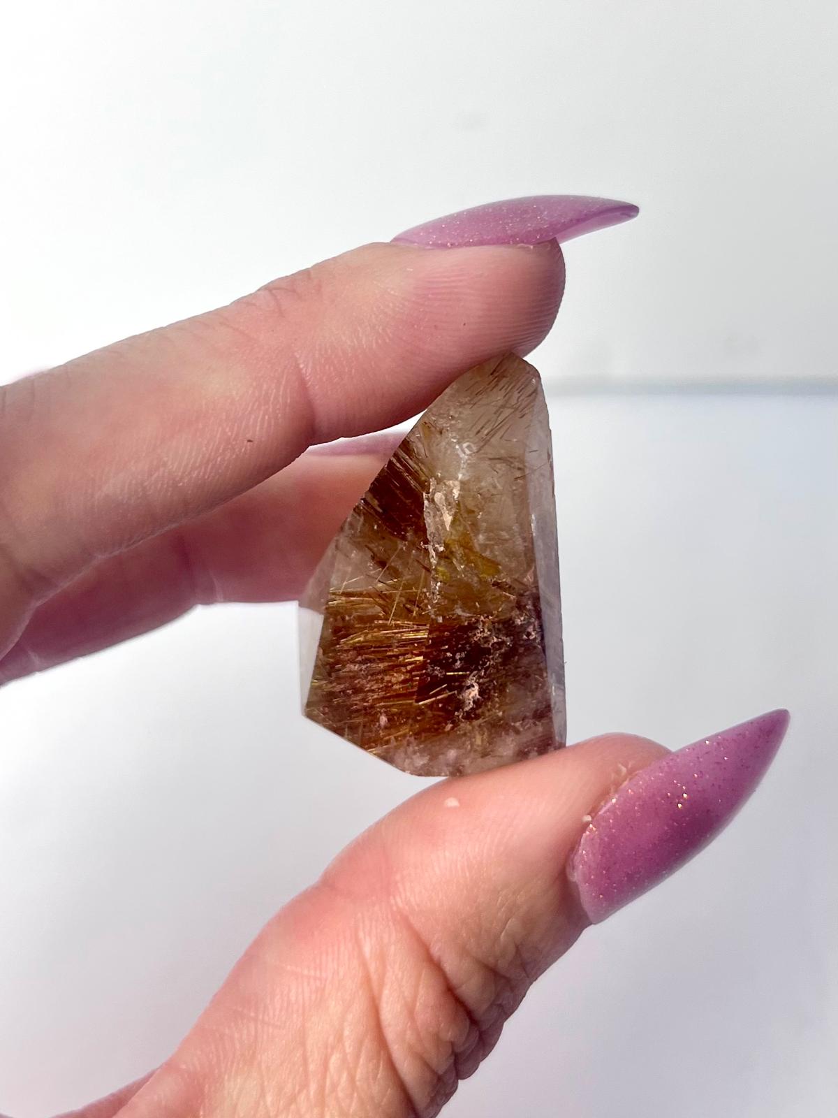 Golden Rutile Freeform with Hematite Inclusions